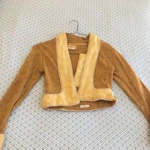 Invest in the Original Voyage gold cropped top